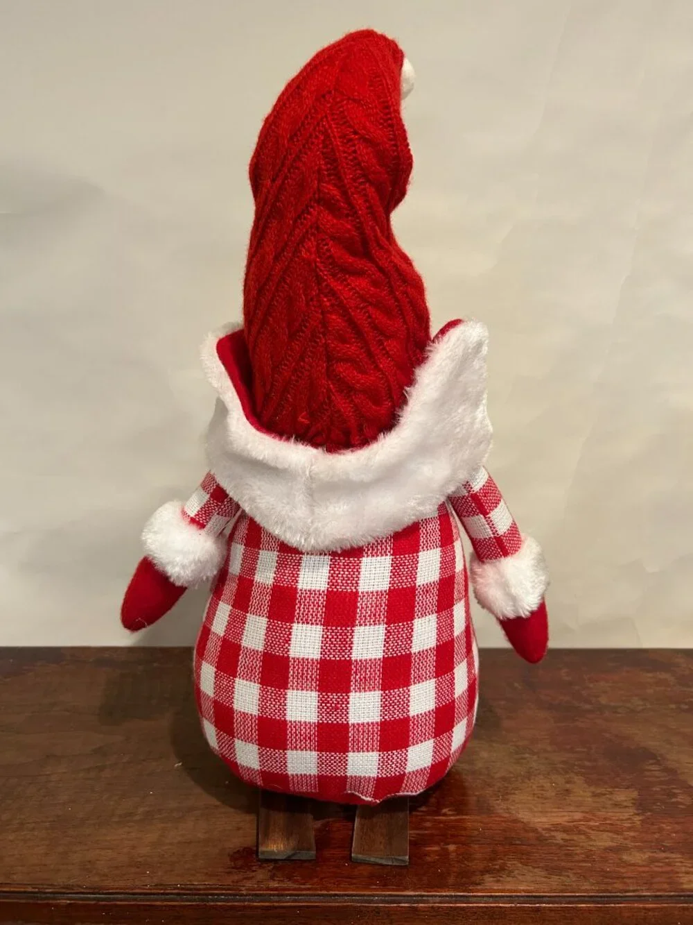 Christmas Holiday Gnome with red knit cap, red plaid torso, wispy white beard